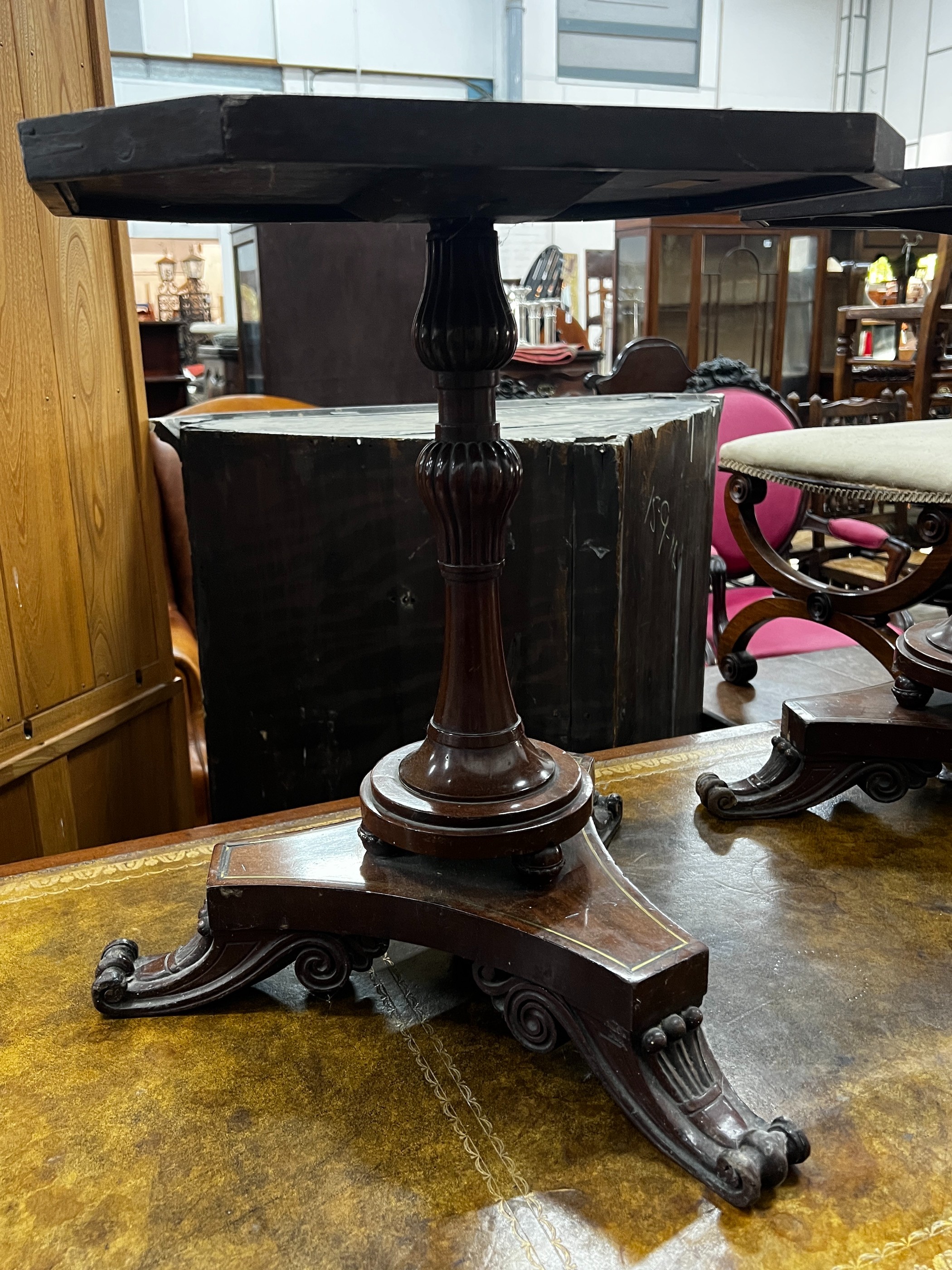 A pair of Regency style brass inlaid rosewood octagonal topped wine tables, width 43cm, depth 33cm, height 49cm